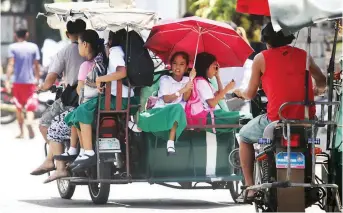  ?? (Ali Vicoy) ?? ONE LANE ONLY – Based on the agreement reached Wednesday, tricycles will be confined to the innermost lane of the national highways and roads in Metro Manila.