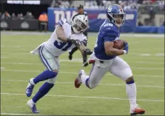  ?? BILL KOSTROUN ?? FILE - In this Dec. 30, 2018, file photo, Dallas Cowboys’ Byron Jones, left, tries to catch New York Giants’ Saquon Barkley during the first half of an NFL football game in East Rutherford, N.J. The dynamic second-year running back is worth the price of admission and can help the team pull off upsets by himself.