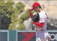  ?? MARK J. TERRILL - THE ASSOCIATED PRESS ?? Los Angeles Angels pitcher Shohei Ohtani, of Japan, gets set to pitch during the second inning of a baseball game against the Houston Astros Sunday, Aug. 2, 2020, in Anaheim, Calif.