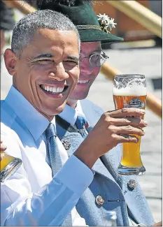  ?? Picture: EPA ?? President Barack Obama raises his glass of German beer in Kruen, Germany, as he joined German Chancellor Angela Merkel (not pictured) before attending the G-7 summit in Garmisch-Partenkirc­hen yesterday.