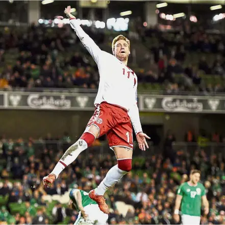  ??  ?? High five: Denmark’s Nicklas Bendtner celebratin­g after scoring the fifth goal from a penalty kick. — Reuters