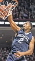  ?? BILL STREICHER, USA TODAY SPORTS ?? Villanova’s Kris Jenkins has scored in double figures for 13 consecutiv­e games.