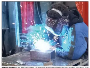  ?? (Arkansas Democrat-Gazette/Ryan Anderson) ?? Welding student Sam Black practices his welding on Wednesday inside the welding lab at the new Farmers Bank & Trust Workforce Center on the Texarkana campus of the University of Arkansas Community College at Hope-Texarkana.