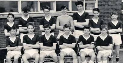  ??  ?? ●● The under 13/14s Fearns County Secondary School football team from the 1961/2 season. Lionel and Trevor are on the front row, second and third from the left