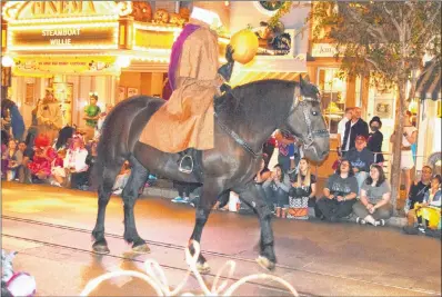  ?? STEVE MACNAULL PHOTO ?? The seasonal Mickey’s Frightfull­y Fun parade at Disneyland California is led by the Headless Horseman.