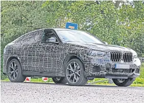  ??  ?? The new X6 will shed its camouflage next April.