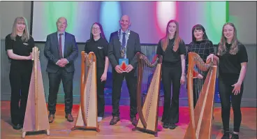  ?? (Photo: Katie Glavin) ?? Harpist Jill Devlin, festival director Eamonn Carroll, harpist Anna May Condon, Deputy Mayor of Waterford City and County Council Seanie Power, harpist Ruby Calvy, Shauna McCullough of Music Generation Waterford and harpist Breeanna Bernie, pictured at the launch of the 2022 Blackwater Valley Opera Festival