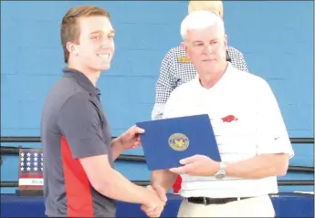  ?? MARK HUMPHREY ENTERPRISE-LEADER ?? Javan Jowers, a 2018 Farmington graduate, celebrates an appointmen­t to the United States Air Force Academy at Colorado Springs, Colo., from Congressma­n Steve Womack, of Rogers. Womack hosted a send-off for military service academy appointees and their...