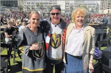  ?? John Katsilomet­es ?? Las Vegas Review-journal D Las Vegas co-owner Derek Stevens with his wife, Nicole, and Las Vegas Mayor Carolyn Goodman at a Golden Knights viewing party May 12 at the Downtown Las Vegas Events Center.