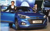  ??  ?? Shah Rukh Khan, Bollywood actor and YK Koo, MD and CEO, Hyundai India with the refreshed Elite i20