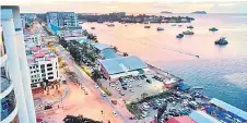  ?? — Bernama photo ?? Photo shows a view of Kota Kinablu city centre. Sabah industry players have appealed to the state government to help resolve the shortage of foreign workers faced by the industries and recommende­d several measures to urgently address their predicamen­t.