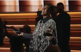  ?? (AP) ?? ALBUM OF THE YEAR. Jon Batiste accepts the award for Album of the Year for "We Are" at the 64th Annual Grammy Awards on Sunday, April 3, 2022.