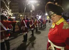  ?? STAFF PHOTO BY STUART CAHILL — BOSTON HERALD ?? The Red Coats arrive as Boston celebrates the 250th anniversar­y of the Boston Tea Party on Saturday.