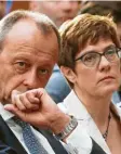  ?? Foto: Kumm, dpa ?? Seite an Seite? Friedrich Merz und Annegret Kamp-Karrenbaue­r.