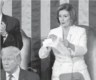  ?? REUTERS ?? Speaker of the House Nancy Pelosi rips up the speech of U.S. President Donald Trump after his State of the Union address to a joint session of the U.S. Congress in the House Chamber of the U.S. Capitol in Washington on Tuesday.