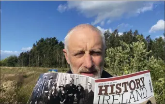  ??  ?? Reporter David Medcalf reads a recent edition of ‘History Ireland’.