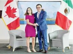  ??  ?? Canadian Minister of Foreign Affairs Freeland shakes hands with Mexican Secretary of Economy Guajardo before the first round of talks to renegotiat­e the NAFTA at the Embassy of Canada in Washington, US. The US, Canada and Mexico on Wednesday opened...