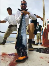  ?? CONTRIBUTE­D ?? Watsonvill­e’s John Del Rosario with one of three wahoo he caught on a Royal Star long-range trip this week.