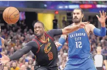  ?? TONY DEJAK/ASSOCIATED PRESS ?? Cleveland’s Dwyane Wade loses control of the basketball as Oklahoma City’s Steven Adams (12) defends during Saturday’s game. The Cavaliers lost 148-124.