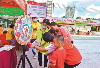  ?? PHOTOS PROVIDED TO CHINA DAILY ?? The local legislativ­e outreach office in Jianghai district, Jiangmen city, Guangdong province, holds a promotiona­l event to popularize the Law on the Protection of Minors.