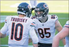  ?? STEPHEN B. MORTON/AP ?? Chicago Bears quarterbac­k Mitch Trubisky celebrates his rushing touchdown with tight end Cole Kmet on Sunday.