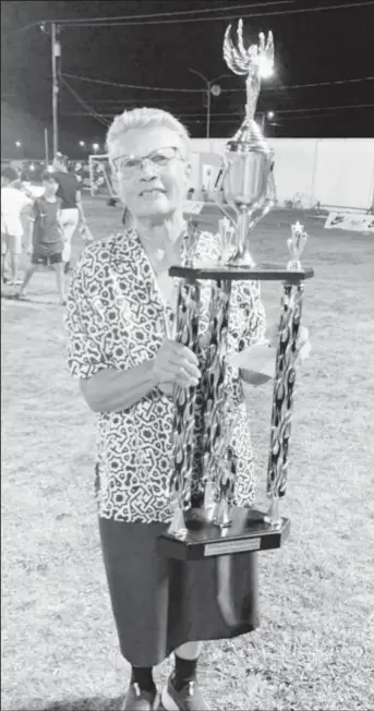  ?? ?? Sister Marie poses with the winning trophy of the 2023 MVP Sports sponsored Girls Under 11 Pee Wee football tournament which Marian Academy won.