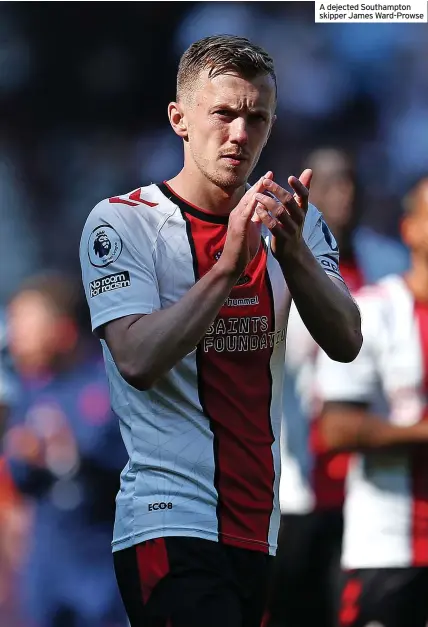  ?? ?? A dejected Southampto­n skipper James Ward-Prowse