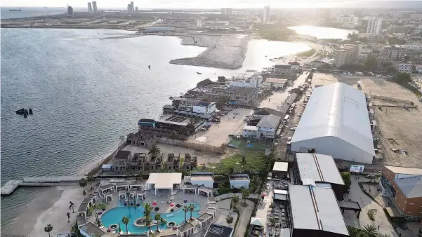  ?? ?? Aerial view of Atlantic Ocean beach waterfront, Victoria Island, Lagos