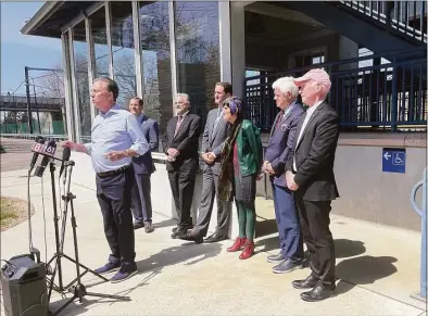  ?? Abigail Brone / Hearst Connecticu­t Media ?? Gov. Ned Lamont joins U.S. Sen. Richard Blumenthal; U.S. Reps. John Larson, Joe Courtney, Rosa DeLauro and Jim Himes, as well as Transporta­tion Commission­er Joe Giulietti, at the Guilford train station on Wednesday.