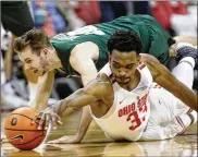  ?? PAUL VERNON / ASSOCIATED PRESS ?? Ohio State’s Keita Bates-Diop (right) battles William & Mary’s Connor Burchfield for a loose ball. Bates-Diop led the Buckeyes with 27 points.