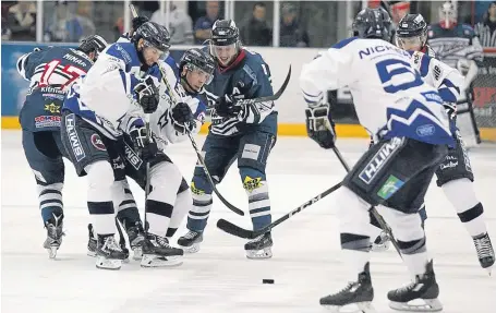  ?? Picture: Derek Black. ?? Dundee Stars and Milton Keynes Lightning players clash at Dundee Ice Arena in October.