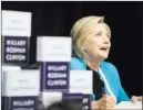  ?? Seth Wenig ?? The Associated Press Hillary Clinton signs copies of her book “What Happened” at a bookstore Tuesday in New York.