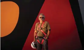  ?? ?? Mural artist Alejandro ‘El Mono’ González in front of a 46-metre mural in Santiago, Chile, on 14 October 2023. Photograph: Tamara Merino/The Guardian