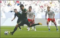  ?? The Associated Press ?? BY A MILE: Australia’s Mile Jedinak scores his side’s opening goal from the penalty spot during the Group C draw against Denmark Thursday in the 2018 FIFA World Cup Samara, Russia. The Danes are three points ahead of the Aussies as the two teams next...