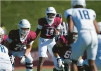  ?? ?? Lafayette sophomore quarterbac­k Ah-Shaun Davis awaits the snap during Saturday’s game against Georgetown.