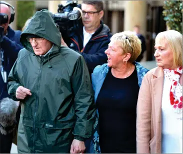  ??  ?? Neil Crilley was confronted outside the court by angry sisters of Maureen, centre, Kathleen Freil and right, Helen Jamieson