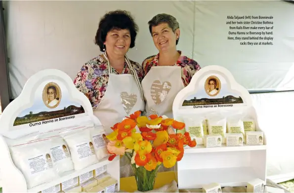  ??  ?? Alida Taljaard (left) from Bonnievale and her twin sister Christine Bothma from Kuils River make every bar of Ouma Hanna se Boerseep by hand. Here, they stand behind the displayrac­ks they use at markets.