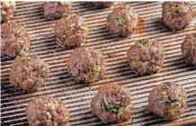  ?? LISA CHERKASKY Washington Post ?? TIPS to make meatballs less dry. | REY LOPEZ, styling