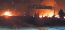  ?? SOURCE: SANA ?? Flames rise after an attack in Kisweh, south of Damascus on Wednesday, an area known to have numerous Syrian military bases.