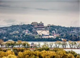  ??  ?? The Summer Palace, located in the northweste­rn suburbs of Beijing, is one of the finest examples of garden architectu­re in China. Covering an area of about 300 hectares, the Summer Palace includes a vast ensemble of hills, lakes and palaces. The photo shows the Summer Palace blanketed with snow in winter. VCG