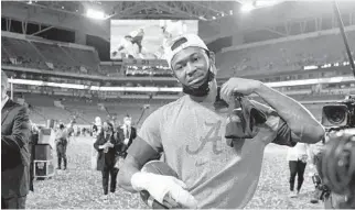  ??  ?? Alabama receiver DeVonta Smith leaves the field after beating Ohio State in the College Football Playoff national championsh­ip game at Hard Rock Stadium on Jan. 11.