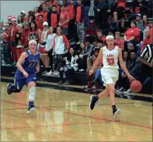  ?? LARRY GREESON / For the Calhoun Times ?? Sonoravill­e’s Alexa Geary (23) dribbles up the court past Ringgold’s Kaylee Womack during Friday’s game.