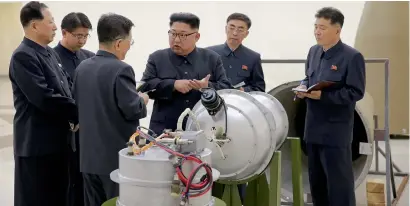  ?? Reuters ?? Kim Jong-un provides guidance on a nuclear weapons programme in this undated photo in Pyongyang on Sunday. —
