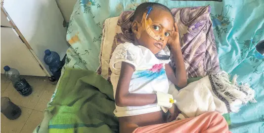  ?? UNCREDITED ?? Genet Mehari, five, is being treated for malnutriti­on but with limited medicine, at the Ayder Referral Hospital in Mekele, in the Tigray region of northern Ethiopia.