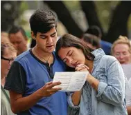  ??  ?? Texas State University students Carson Asher and Alaniz Amillano were among the worshipper­s in Dickinson who turned out for Sunday’s outdoor service.