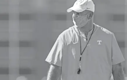  ?? ANDREW FERGUSON/TENNESSEE ATHLETICS COMMUNICAT­IONS ?? Jeremy Pruitt monitors a preseason practice on Aug. 17. Pruitt is entering his third season as Tennessee's coach. The Vols are 0-2 in season openers under Pruitt.