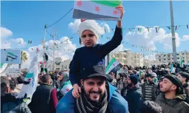  ?? Photograph: Anadolu Agency/Getty Images ?? Protesters pack Idlib’s central square on Tuesday to mark 15 March 2011, the start of the Syrian uprising.