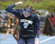  ?? ?? Freeport’s Mackenzie Magness reacts after clearing 11 feet, 7 inches in the pole vault Saturday at the Tri-State Track Coaches Associatio­n Invitation­al. The vault earned her a silver medal.