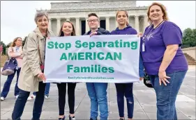  ??  ?? Connie Reguli (far left) demonstrat­ing in the US in September 2018 for CPS reform.