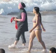  ?? FADEL SENNA / AFP / GETTY IMAGES ?? Socialist Prime Minister Manuel Valls has described the burkini as a “symbol of the enslavemen­t of women” unacceptab­le under France’s secular constituti­on.